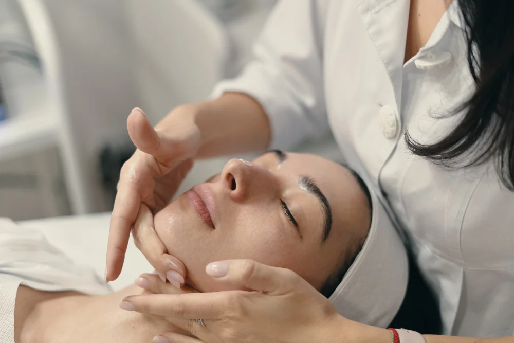 Woman enjoys facial treatment