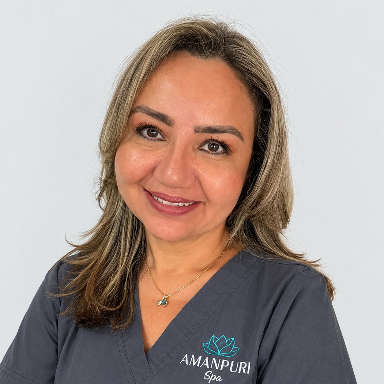 AMANPURI Spa portrait in charcoal scrubs